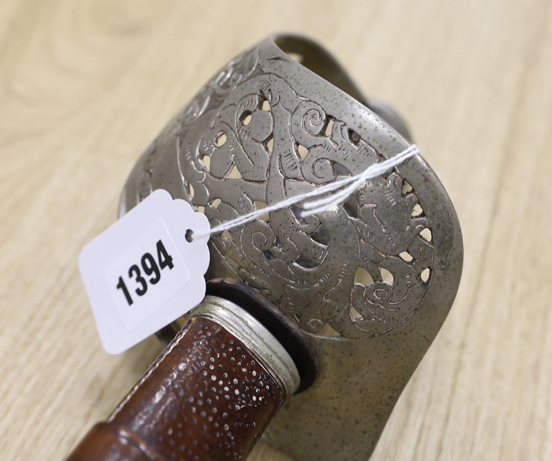 A George V officer's dress sword by Army & Navy Stores Ltd., blade 83cm, within leather scabbard